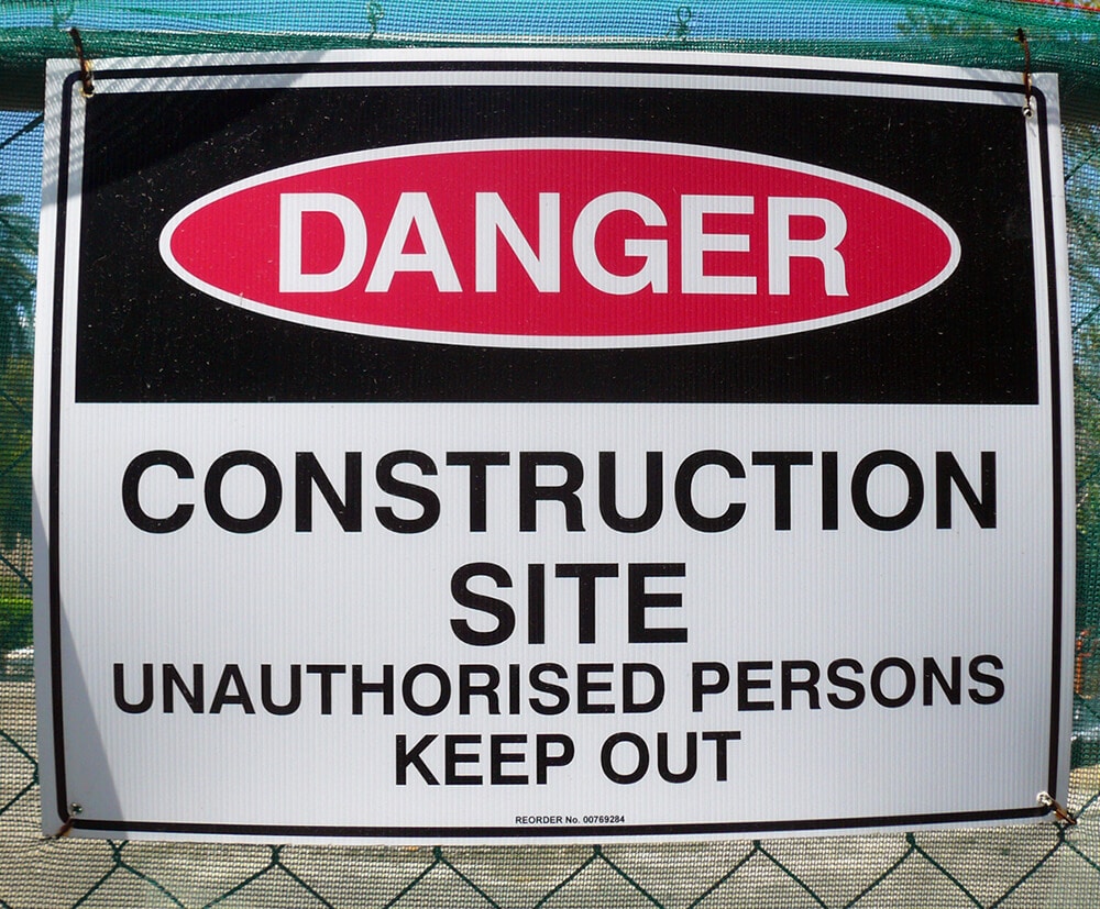 Sign that says Danger, Construction Site, Unauthorised persons keep out