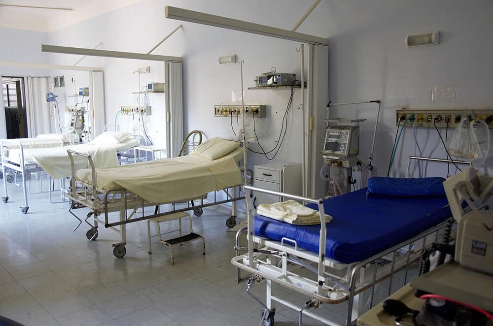 Hospital room with three beds