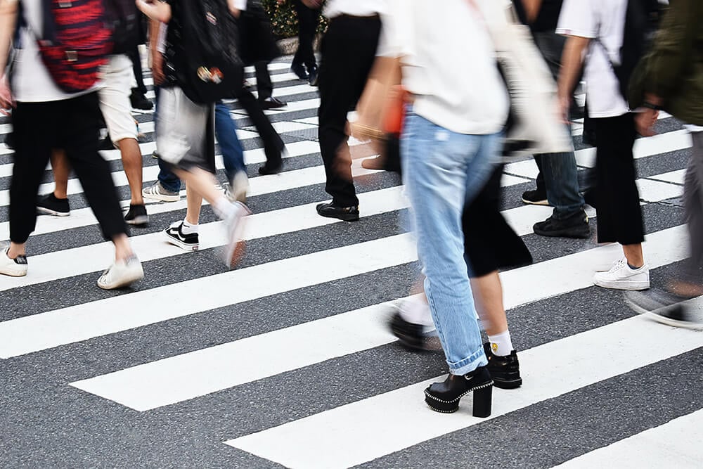 People crossing busy crosswalk